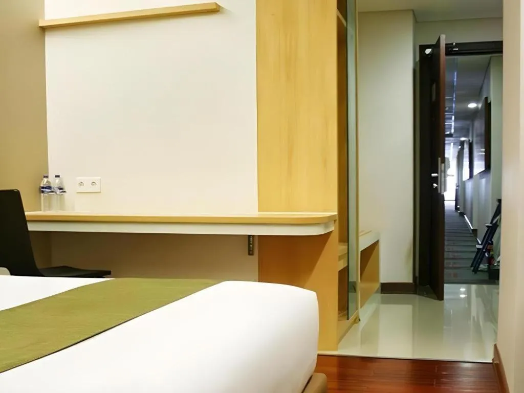 Bed in Sub City Hotel