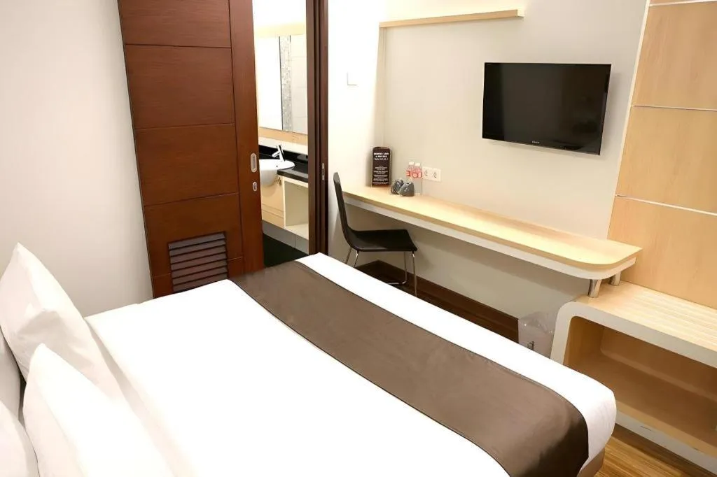 Bed in Sub City Hotel