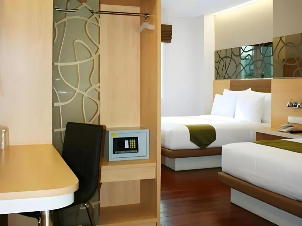 Bed in Sub City Hotel