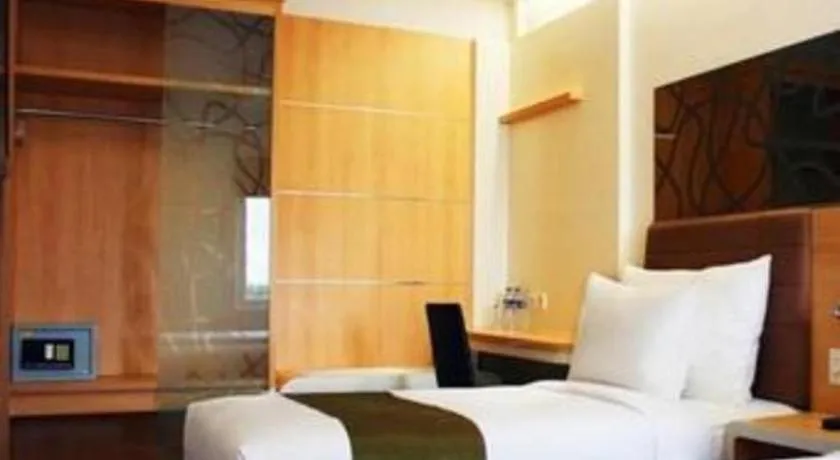 Bed in Sub City Hotel