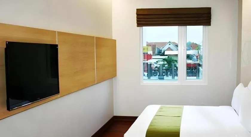 Bed in Sub City Hotel