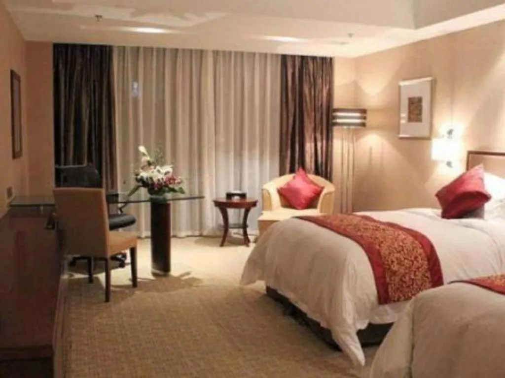 Bed in Blue Horizon International Hotel Gaomi