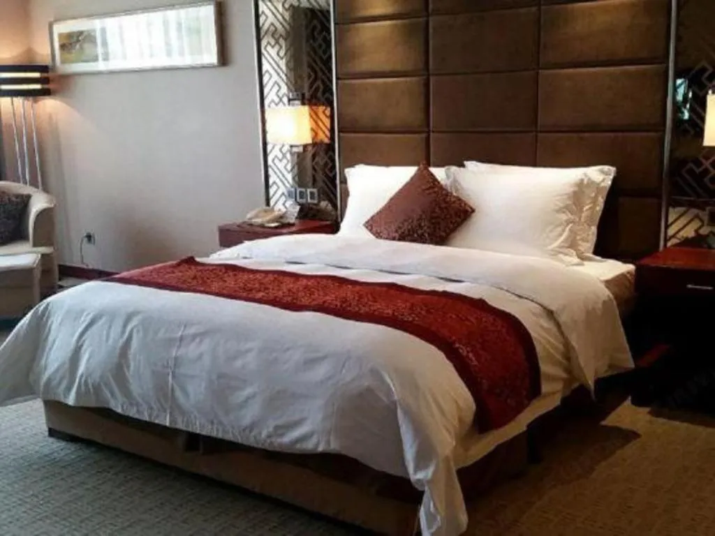 Bed in Blue Horizon International Hotel Gaomi