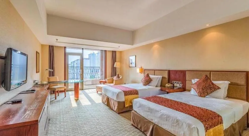 Bed in Blue Horizon International Hotel Gaomi