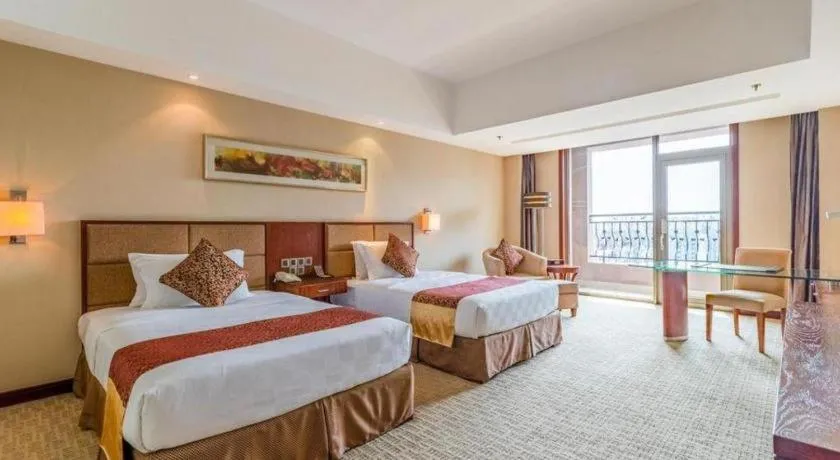 Bed in Blue Horizon International Hotel Gaomi