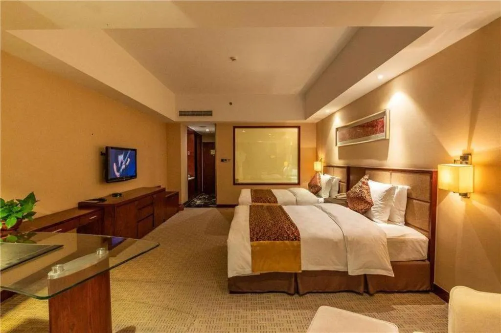 Bed in Blue Horizon International Hotel Gaomi