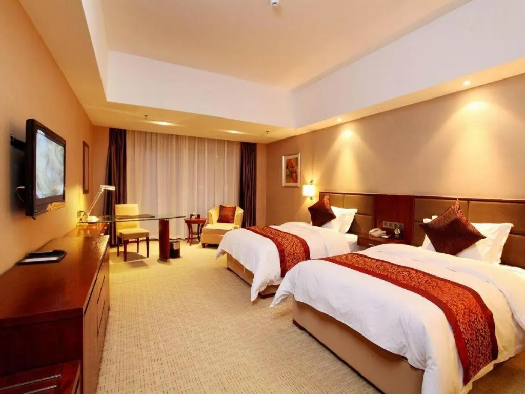 Bed in Blue Horizon International Hotel Gaomi