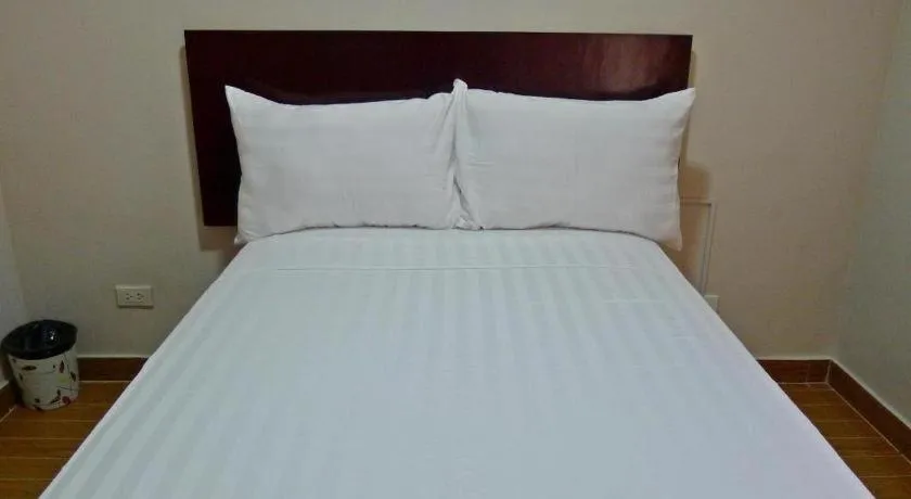 Bed in Rovic's Tourist Hotel