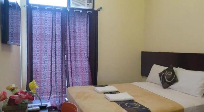 Bed in Rovic's Tourist Hotel