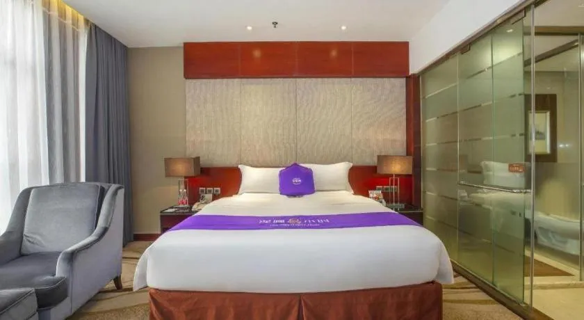 Bed in Quanzhou Jinjiang Hollyston Hotel