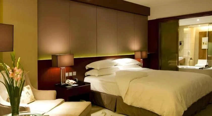 Bed in Quanzhou Jinjiang Hollyston Hotel