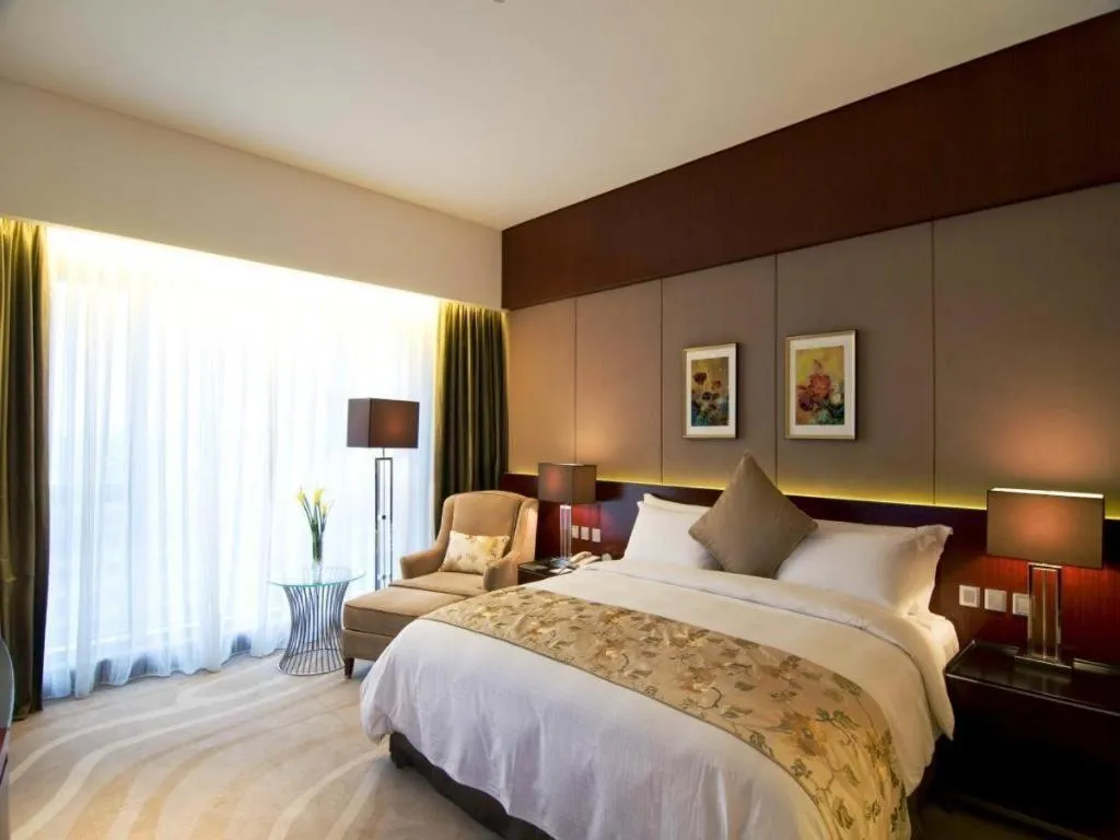 Bed in Quanzhou Jinjiang Hollyston Hotel