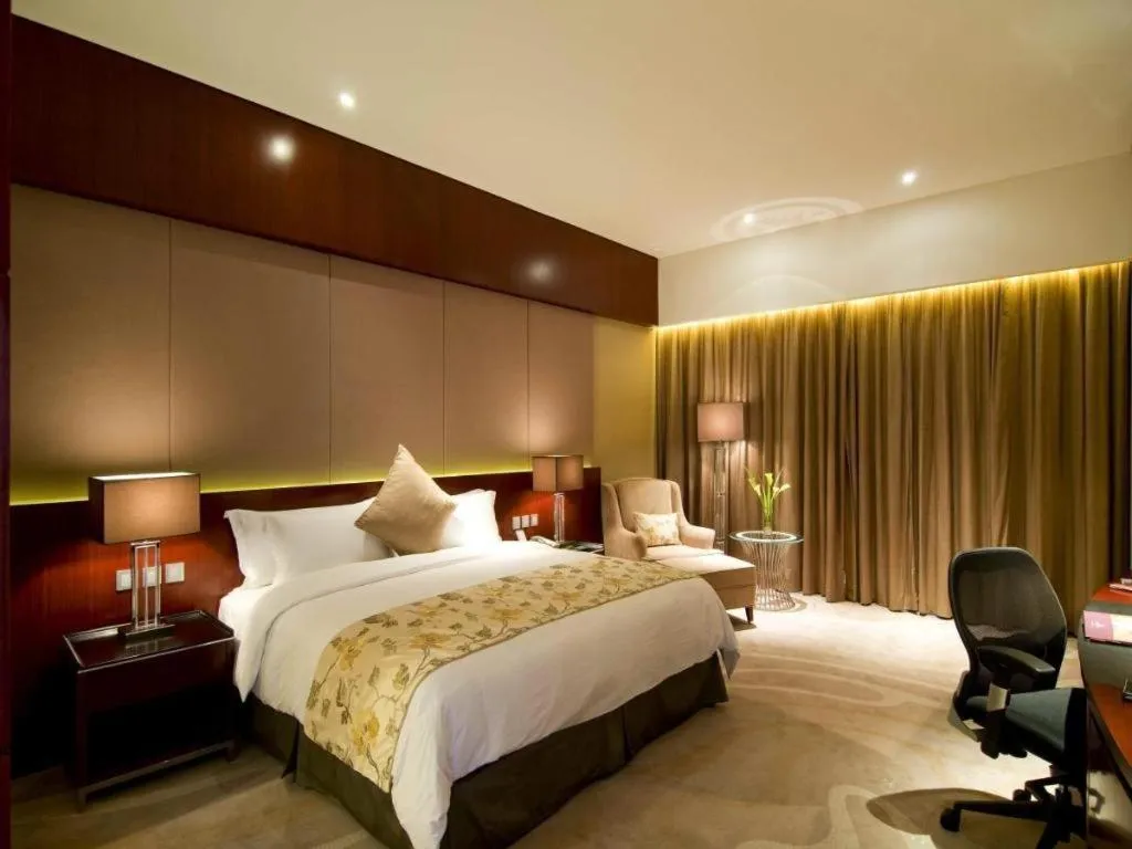 Bed in Quanzhou Jinjiang Hollyston Hotel