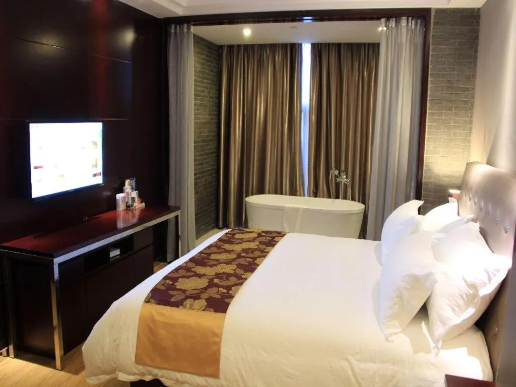 Bed in Baolong Homelike Hotel Shanghai Changxing Branch