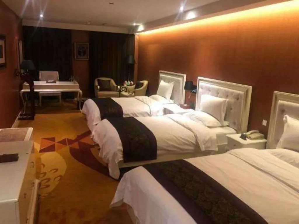 Bed in Metropark Hotel