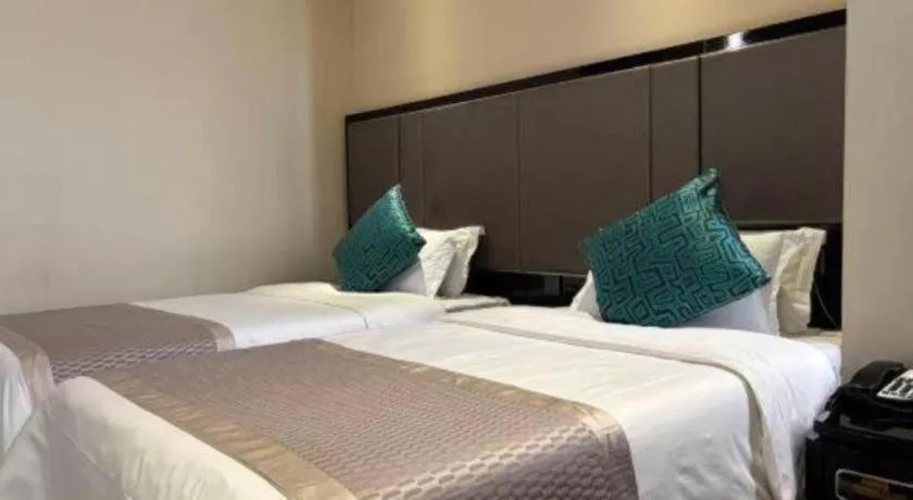 Bed in Pacific Regency Hotel Shenyang