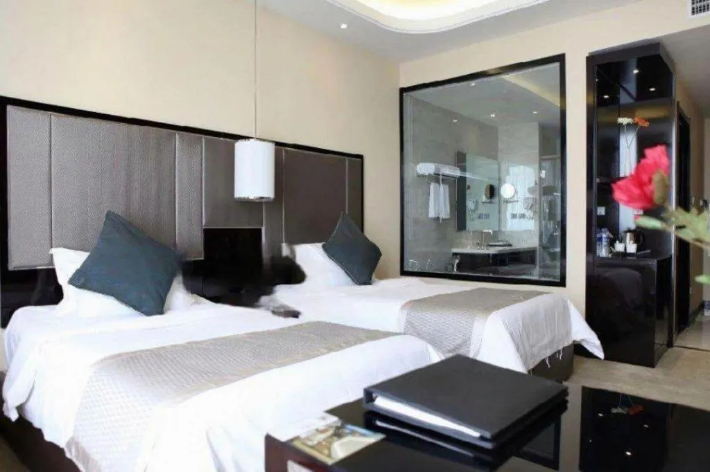 Bed in Pacific Regency Hotel Shenyang