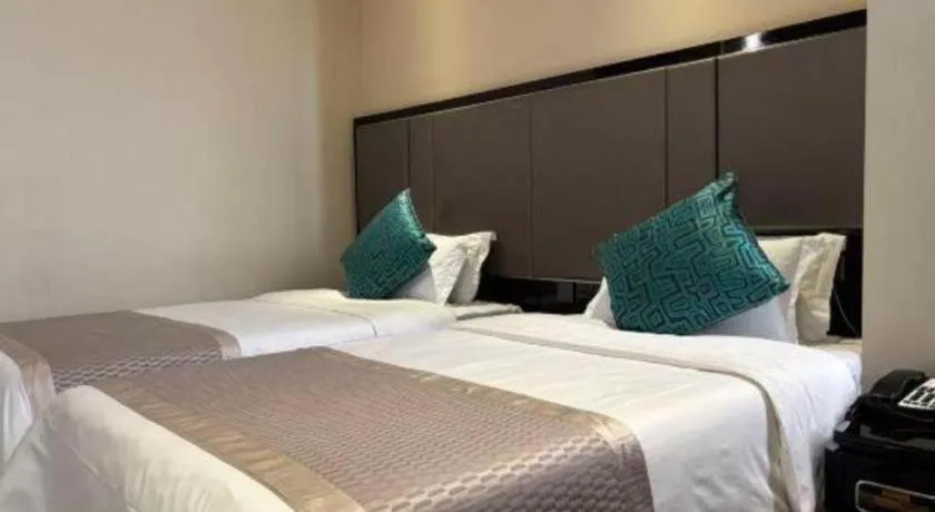 Bed in Pacific Regency Hotel Shenyang