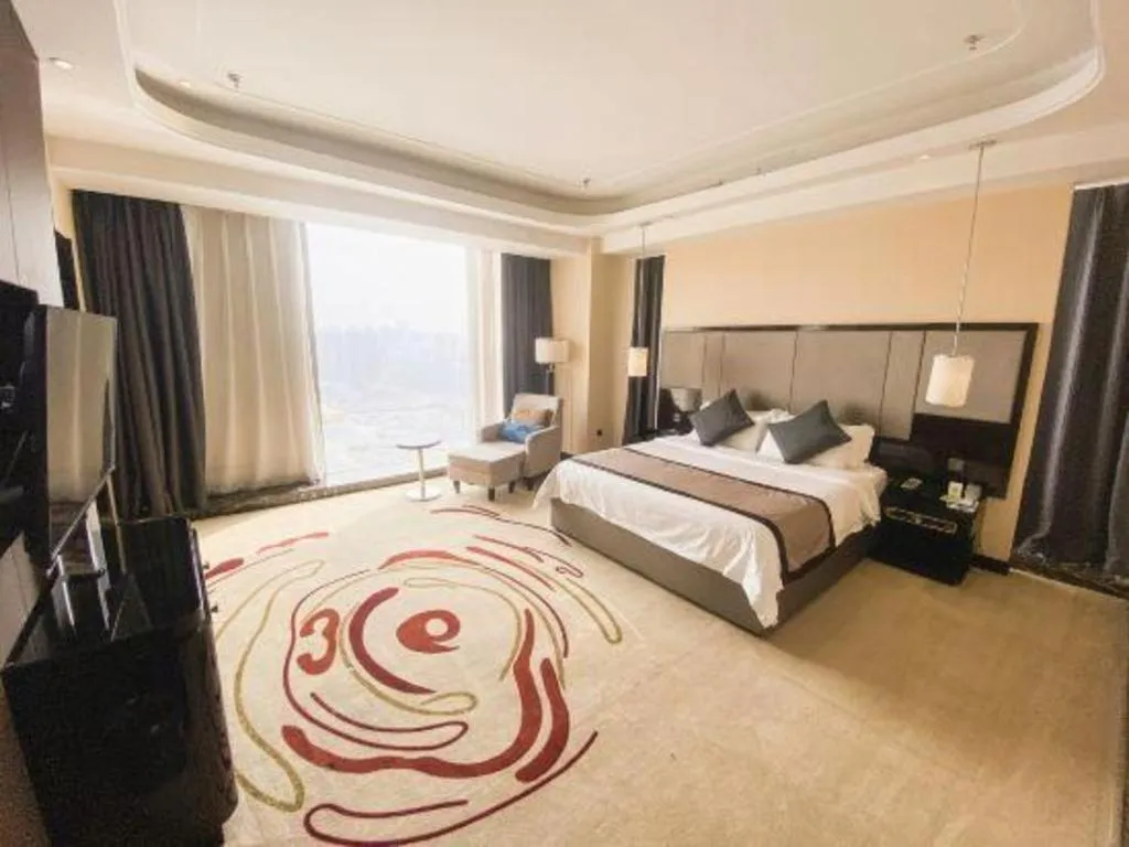 Bed in Pacific Regency Hotel Shenyang
