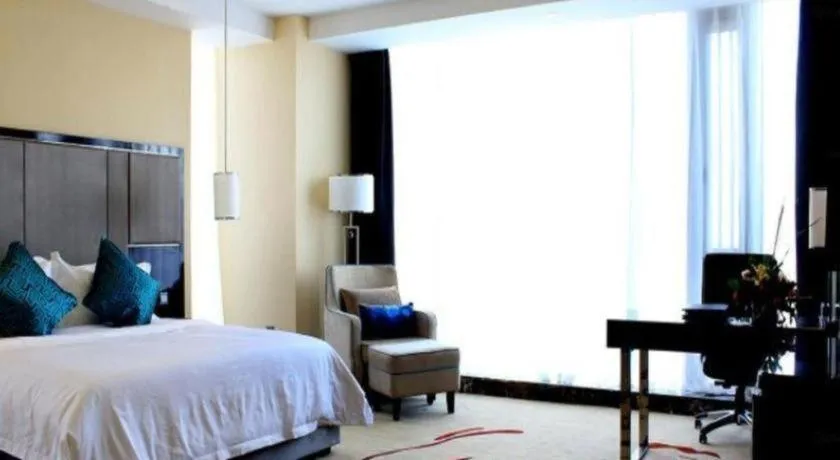 Bed in Pacific Regency Hotel Shenyang