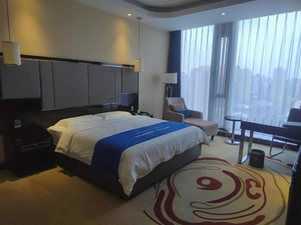 Bed in Pacific Regency Hotel Shenyang