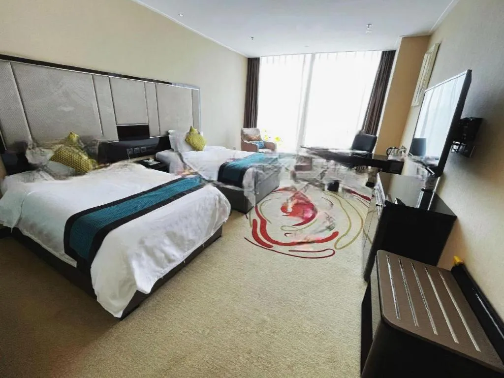 Bed in Pacific Regency Hotel Shenyang