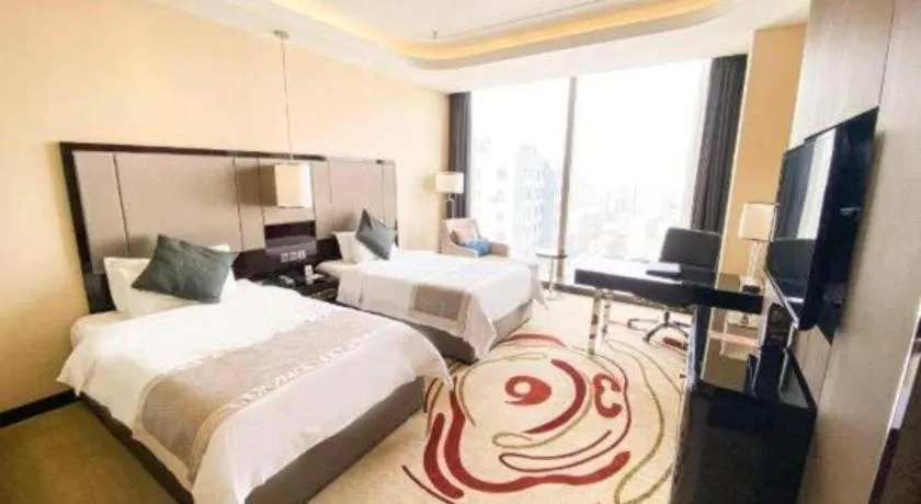 Bed in Pacific Regency Hotel Shenyang