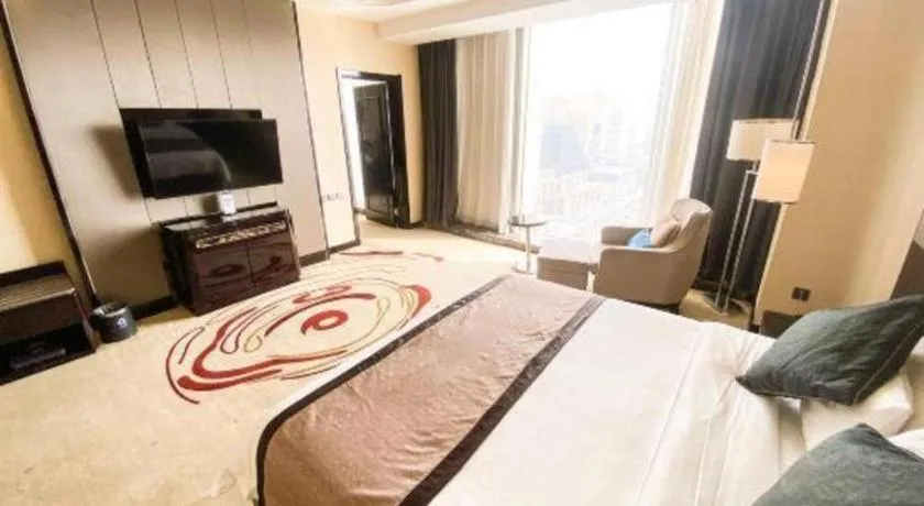 Bed in Pacific Regency Hotel Shenyang