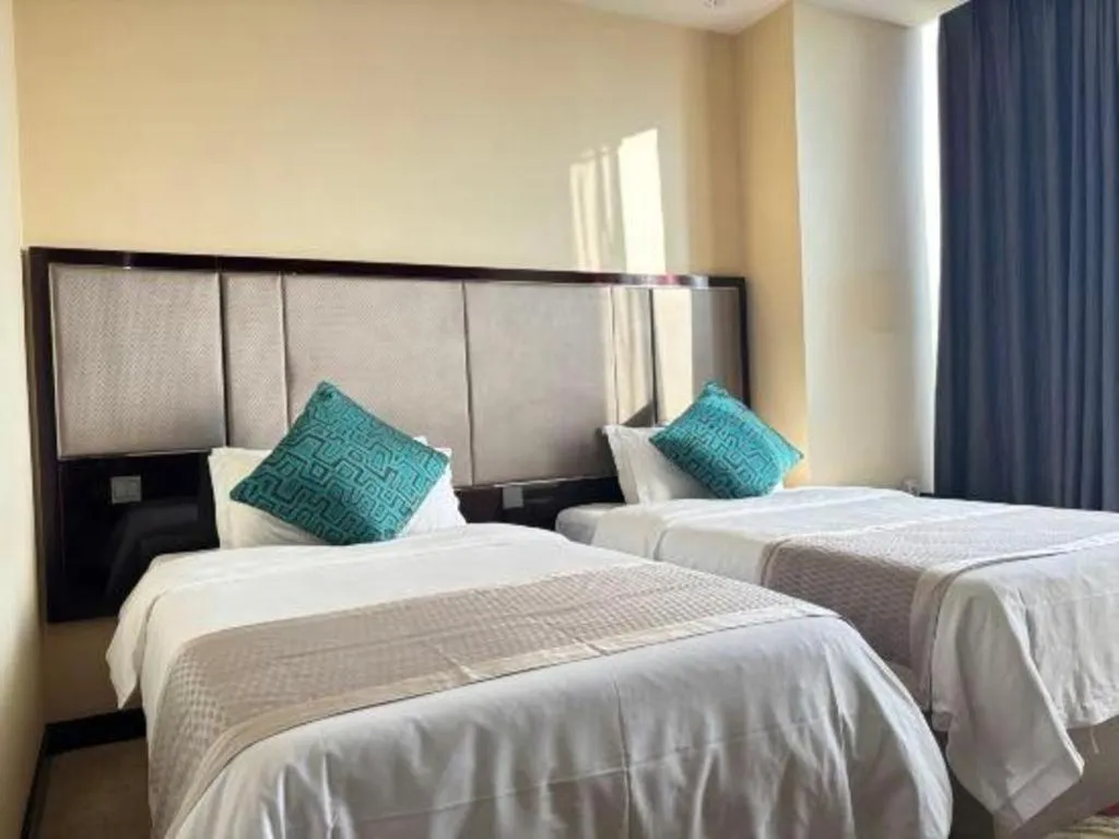 Bed in Pacific Regency Hotel Shenyang