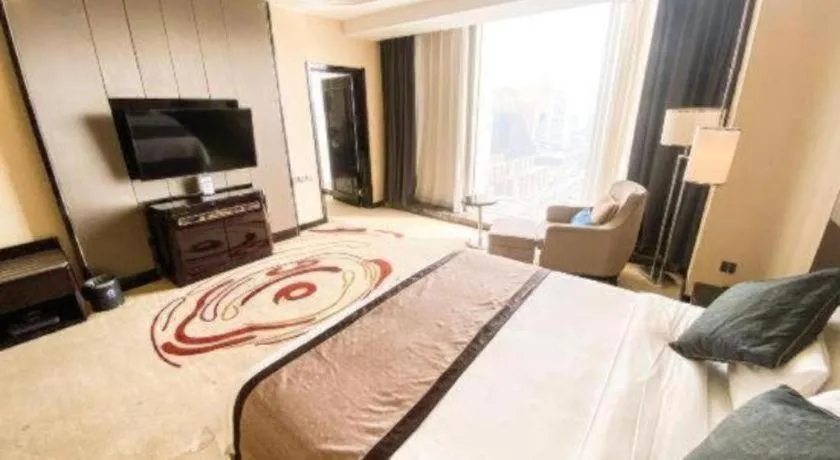 Bed in Pacific Regency Hotel Shenyang