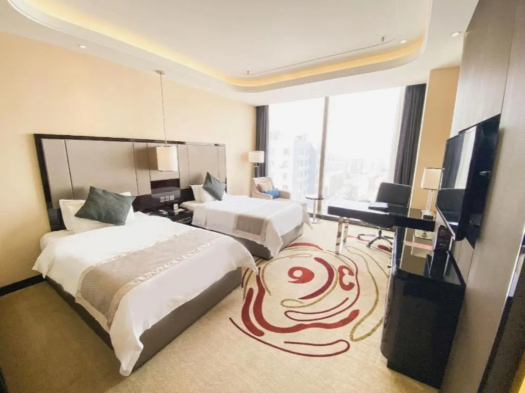 Bed in Pacific Regency Hotel Shenyang