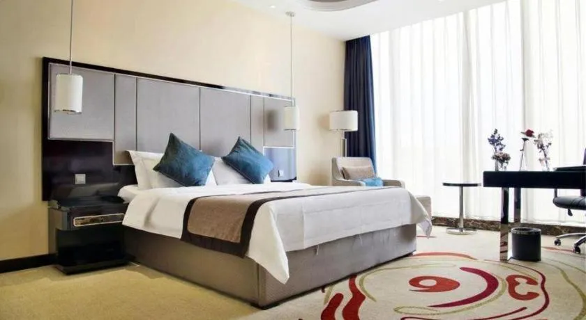 Bed in Pacific Regency Hotel Shenyang