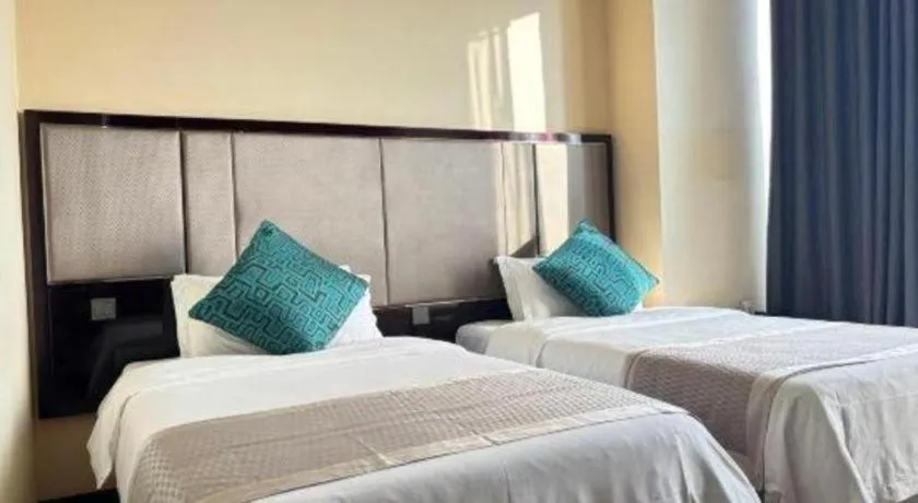 Bed in Pacific Regency Hotel Shenyang