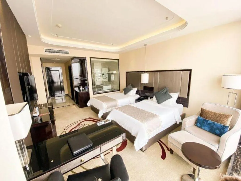 Bed in Pacific Regency Hotel Shenyang