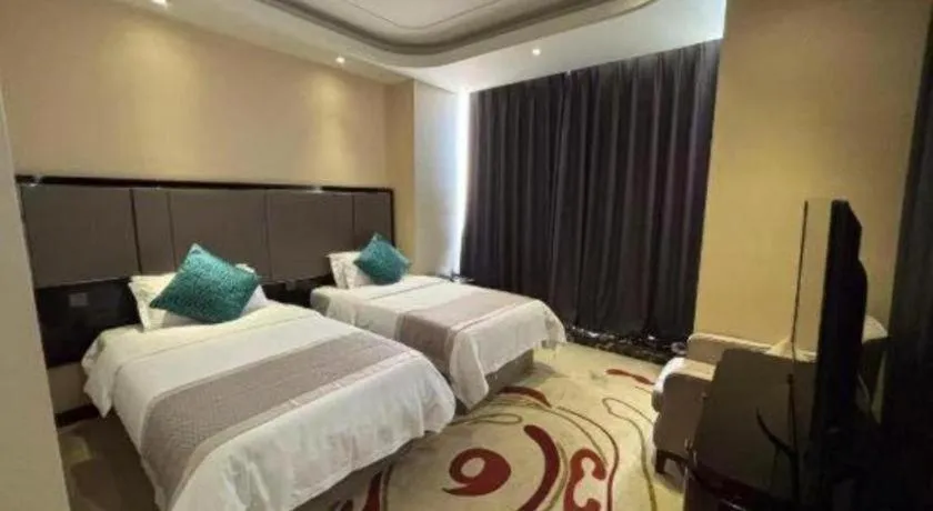 Bed in Pacific Regency Hotel Shenyang