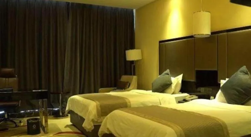 Bed in Pacific Regency Hotel Shenyang