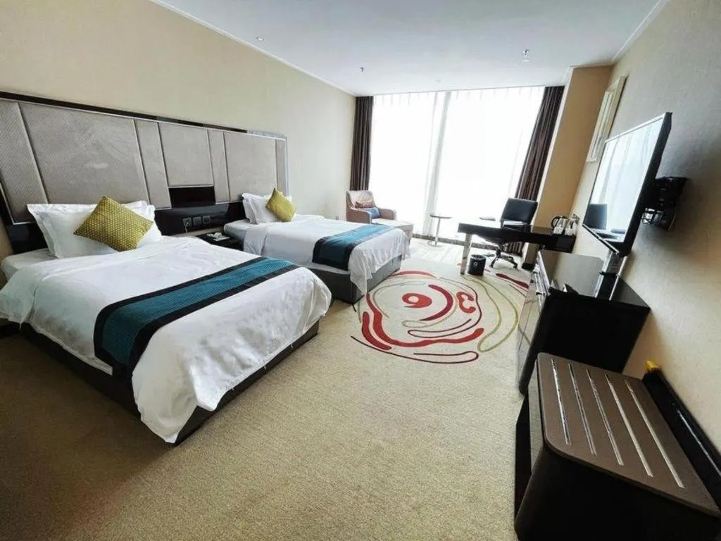 Bed in Pacific Regency Hotel Shenyang