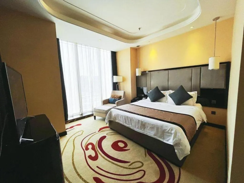 Bed in Pacific Regency Hotel Shenyang