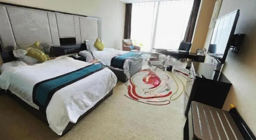 Bed in Pacific Regency Hotel Shenyang