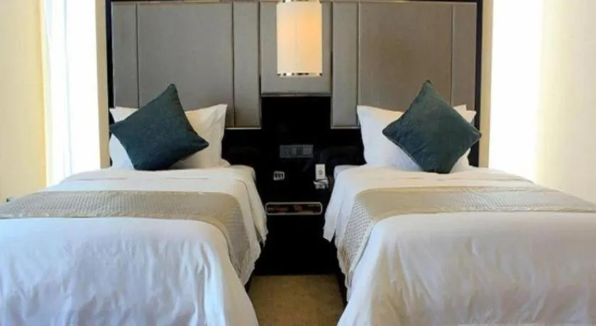 Bed in Pacific Regency Hotel Shenyang