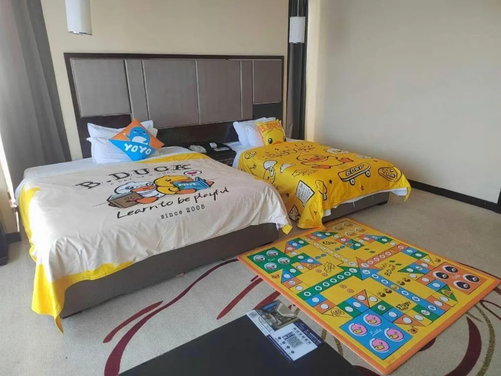 Bed in Pacific Regency Hotel Shenyang