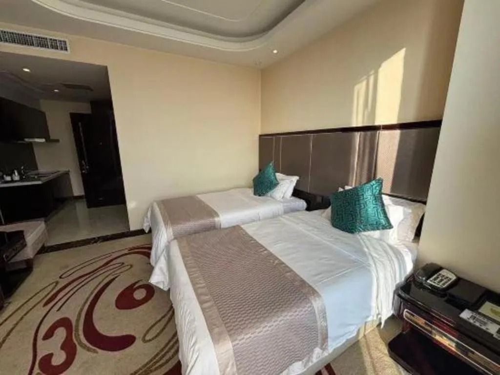 Bed in Pacific Regency Hotel Shenyang