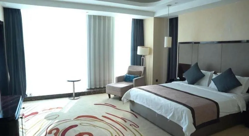 Bed in Pacific Regency Hotel Shenyang