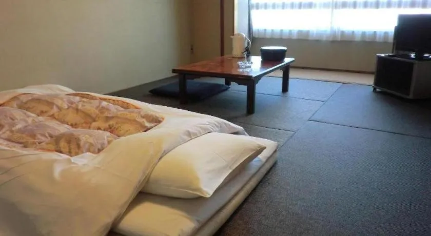 Bed in Hotel Town Center