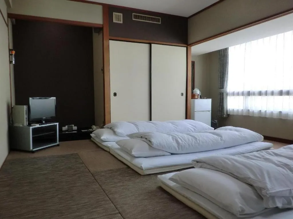 Bed in Hotel Town Center