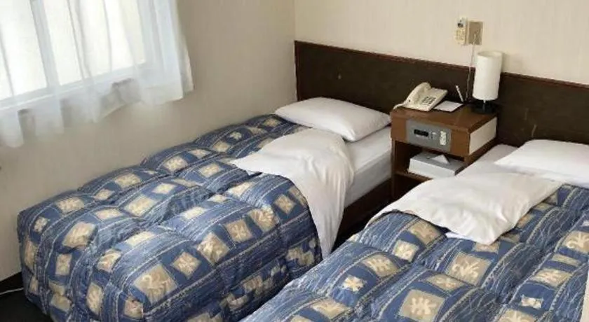 Bed in Hotel Town Nishikigawa