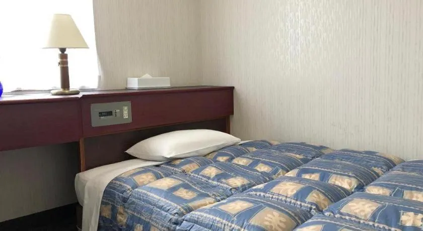 Bed in Hotel Town Nishikigawa