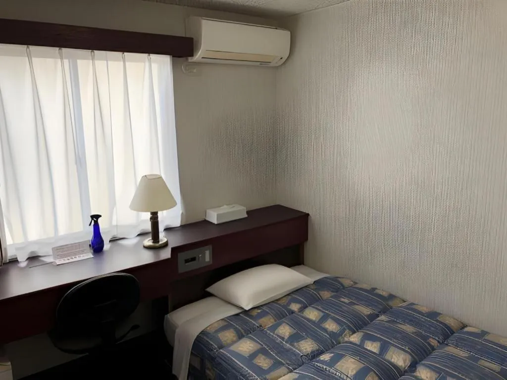 Bed in Hotel Town Nishikigawa