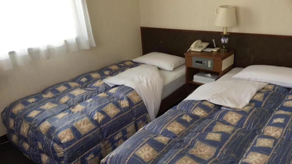 Bed in Hotel Town Nishikigawa