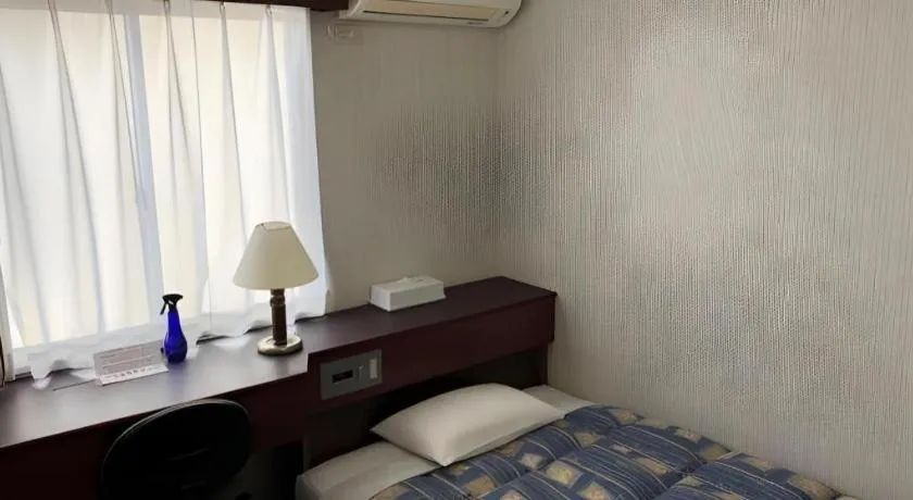 Bed in Hotel Town Nishikigawa